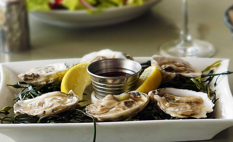 Plated oysters with pickled mignonette sauce