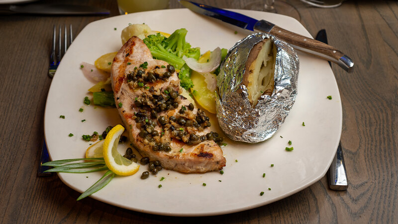 Fish with baked potato entree